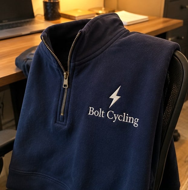 Customer photo of a custom cycling club quarter-zip